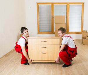 Movers in red uniforms